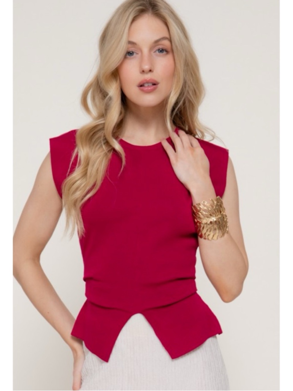 Women's Sleeveless Peplum Top in Fuchsia